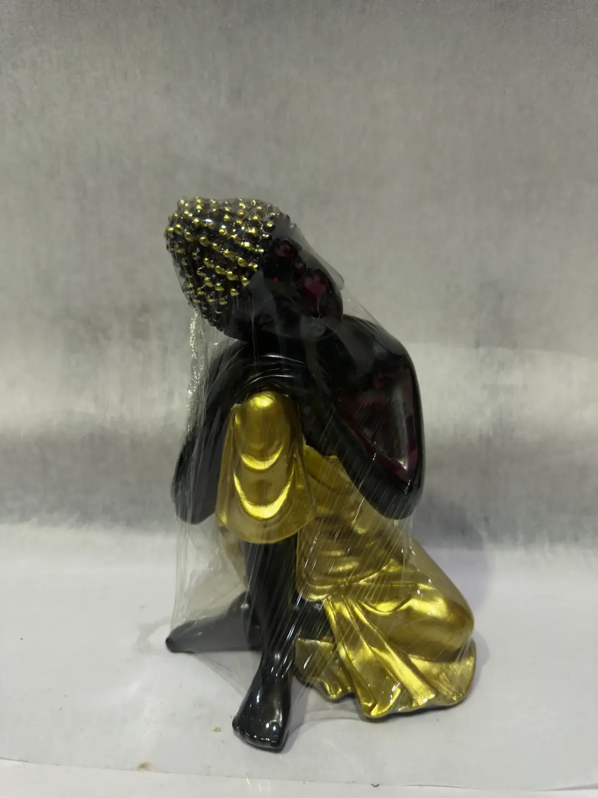 Black Sleeping Gautam Buddha Statue